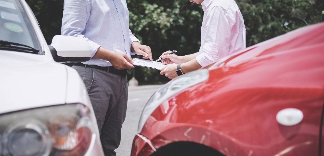 SAD – Car insurance plans simplified 2 guys with red and white car