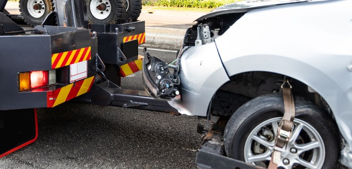 SAD – Your Towing Rights. Be Informed. car being towed