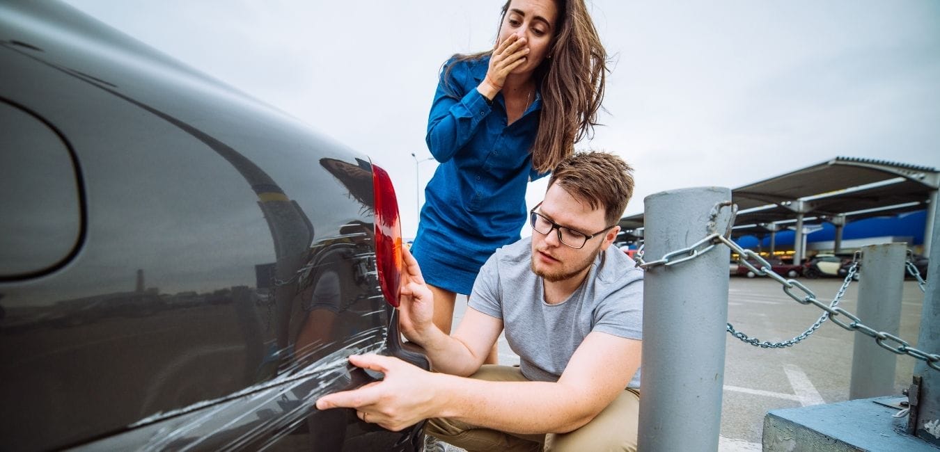 SAD – Page Photos – Rectangular Size – 1350×650 (6) man and woman with car dent after accident