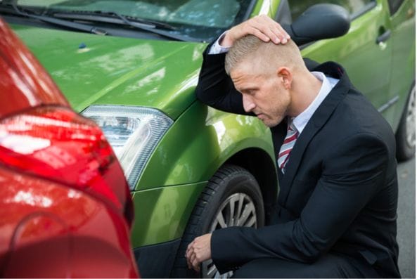 guy with 2 cars red and green