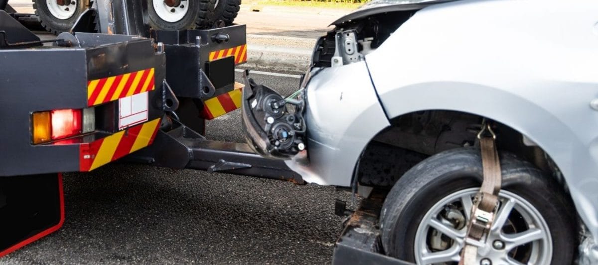 SAD – Your Towing Rights. Be Informed. car being towed